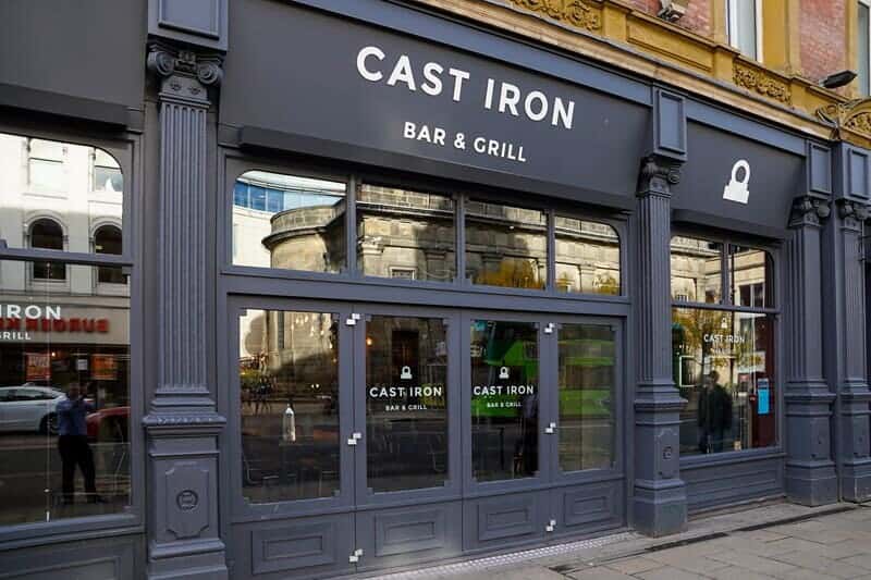 An image of the Cast Iron Bar & Grill exterior signage.